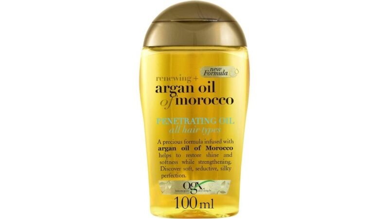 Aceite de argán OGX Renewing para sellar hidratación en rizos y aportar brillo sin apelmazar.